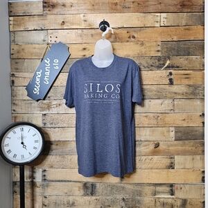 Next level women's lake water blue silos baking Co Waco place size M